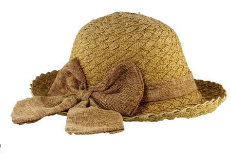 Female summer straw hat with bow on white background.の写真素材