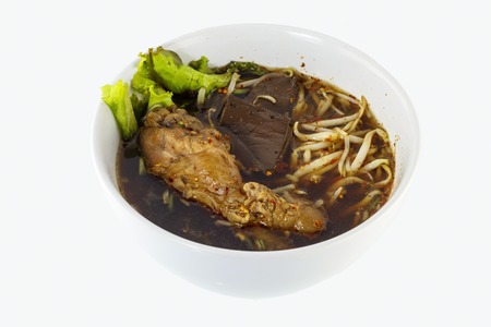 Thailand soup, an ethnic meal of chicken soup, broth, bean sprouts, noodles and basil or cilantro floating on top.の写真素材