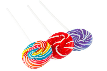 Retro style colorful round shape lollipop on white background.の写真素材