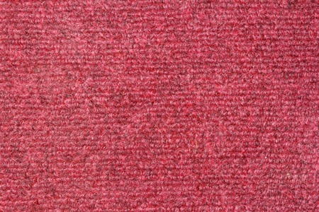 Red plastic doormat texture and background.の写真素材