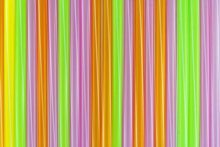Colorful drinking straws on a white background.の写真素材
