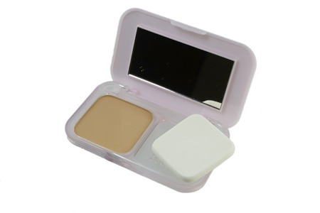 Powder, Puff and Powder-cases with a mirror on a white background.の写真素材