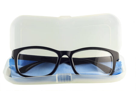 Eye glasses, Black eye glasses on cover of case isolated on white background.の写真素材