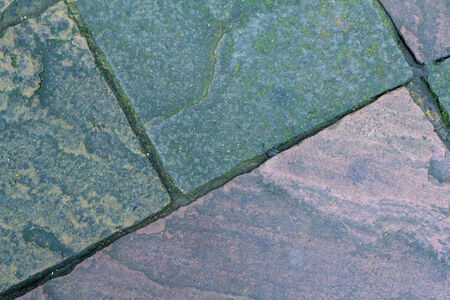 Stone wall background, Textured cobbled wall background with stones and cement.の写真素材