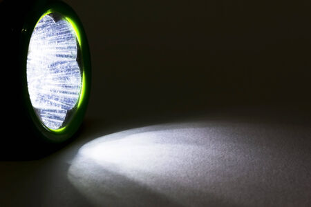 Flashlight, Beam from flashlight closeup on a paper.