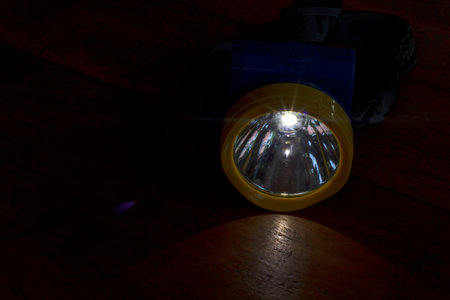 Light bulb, Bright light bulb turned on over black background.の写真素材