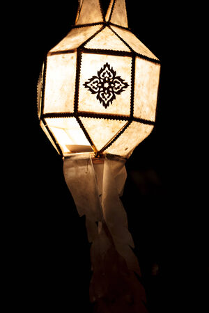 Closeup Group of burning candles in thai style.の写真素材