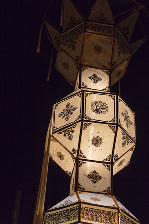 Closeup Group of burning candles in thai style.の写真素材