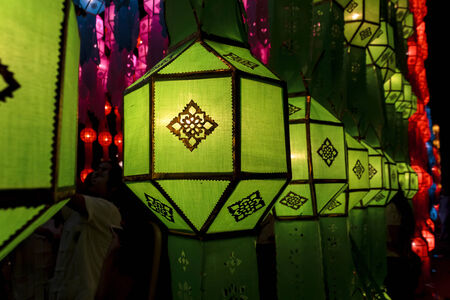 Closeup Group of burning candles in thai style.の写真素材
