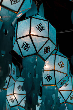 Closeup Group of burning candles in thai style.の写真素材