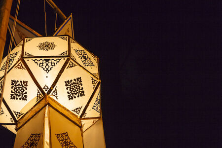 Closeup Group of burning candles in thai style.の写真素材