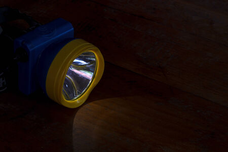 Light bulb, Bright light bulb turned on over black background.の写真素材