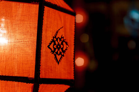 Closeup Group of burning candles in thai style.の写真素材