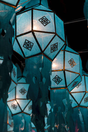 Closeup Group of burning candles in thai style.の写真素材