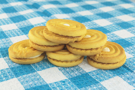 Cookies in shape of buttons on tableの写真素材