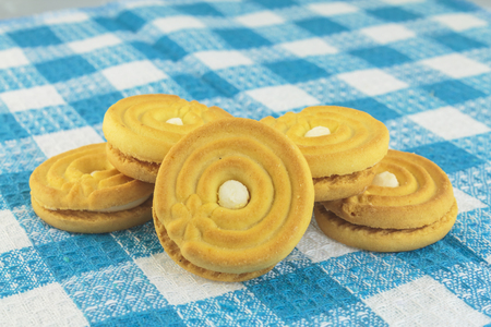 Cookies in shape of buttons on tableの写真素材