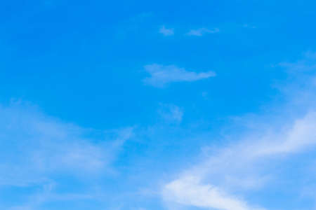 Blue sky background with tiny white cloud.の写真素材