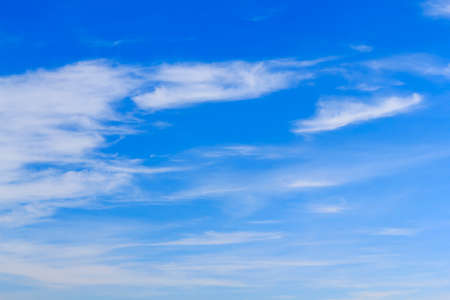 Blue sky background with tiny white cloud.の写真素材