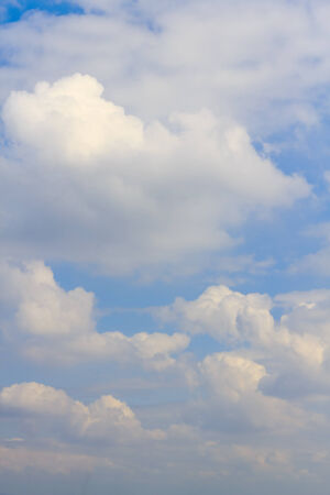 Blue sky background with tiny white cloud.の写真素材