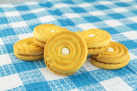 Cookies in shape of buttons on tableの写真素材