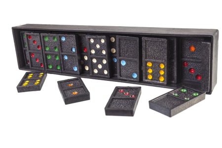 Pieces of domino spread isolated on white backgroundの写真素材