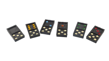 Pieces of domino spread isolated on white backgroundの写真素材