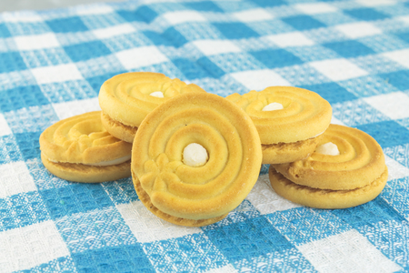 Cookies in shape of buttons on tableの写真素材