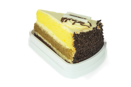 Piece of chocolate cake with cherry on white background.の写真素材