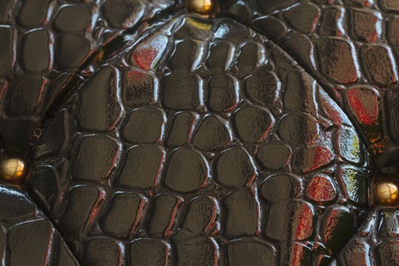 Black leather texture - background. Black leather texture of sofa closeup shot.の写真素材