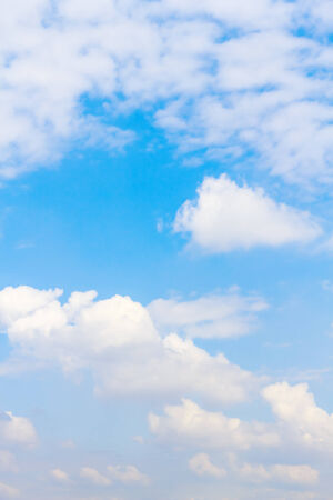 Blue sky background with tiny white cloud.の写真素材