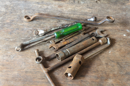 Set of old hand tools on wooden table.の写真素材