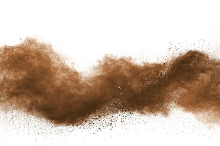 Abstract brown powder splatted on white background