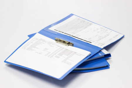 Blurred file folder with documents and documents. retention of contracts. isolated white background