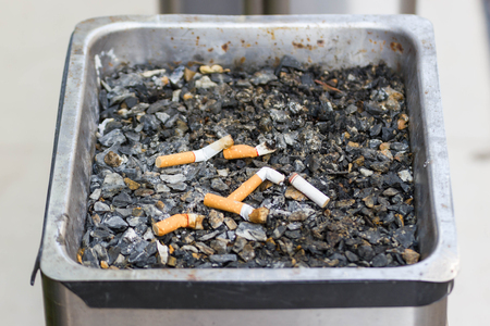 the concept of the world no tobacco day, Many cigarette stubs in the ashtrayの写真素材