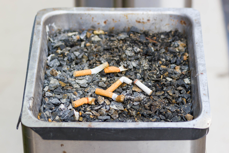 the concept of the world no tobacco day, Many cigarette stubs in the ashtrayの写真素材