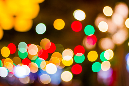 Blur - abstract background - bokeh Decorative outdoor string lights hanging in the garden at night timeの写真素材