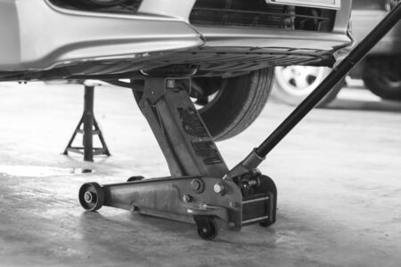 Back and White Tone,Tool hydraulic jack lift car for Maintenance of cars for repairの写真素材
