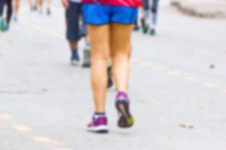Blurred - People jogging on holiday at the park.の写真素材