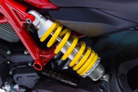 yellow Shock Absorbers of Motorcycle for absorbing joltsの写真素材