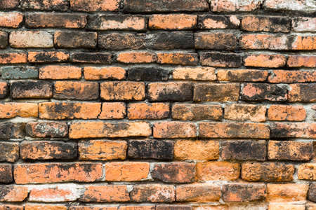 Old brown brick wall for Background textureの写真素材