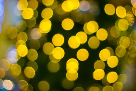 blurred abstract bokeh background for Decorations for New Year and Holidays, Christmas ball lightの写真素材