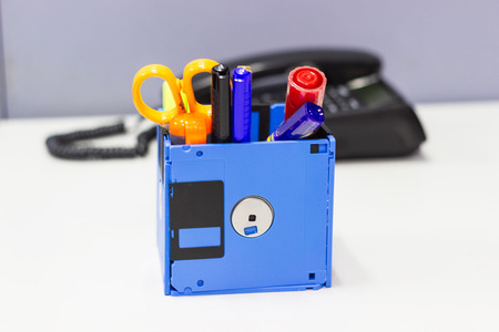 recycle floppy disk, Creative objects used for Store supplies such as pen pencils Scissors in a box...
