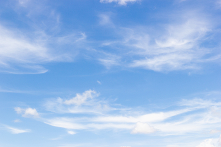Transparent blue sky with clouds and atmospheric afternoon.の写真素材