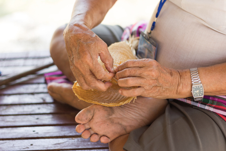 the villagers took bamboo stripes to weave into different forms for daily use utensils of the communityâs people in Bangkok Thailand, Thai handmade product.の写真素材