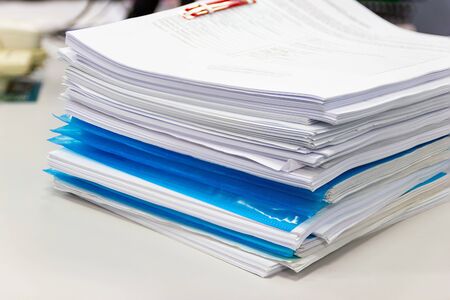 file folder and Stack of business report paper file on the desk in an officeの写真素材