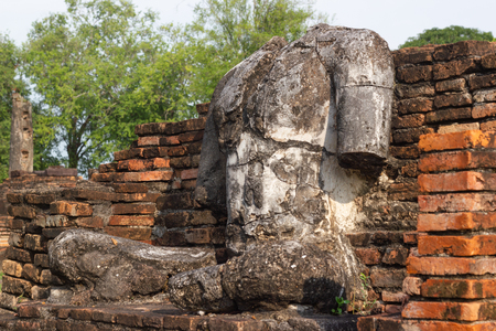 The old buddha image on cement with ruins and ancient, Built in modern history in historical park Sukhothai Thailand.の写真素材