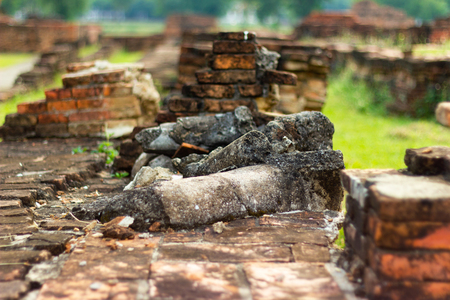 The old buddha image on cement with ruins and ancient, Built in modern history in historical park Sukhothai Thailand.の写真素材
