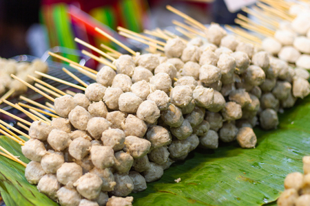 Closeup Thai Food Style Grill pork balls pour on the marketの写真素材
