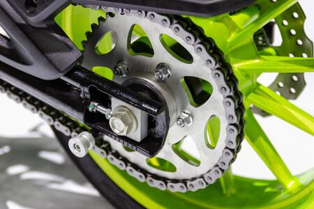 Close up Detail of a motorcycle rear chain part of the motorcycle, concept New innovationの写真素材