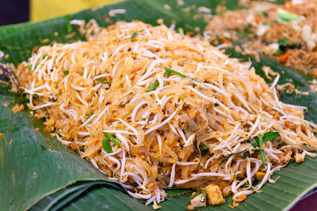 Closeup cooking Pad Thai noodles, Thai street food in the market popular Thai Food Bangkok Thailandの写真素材